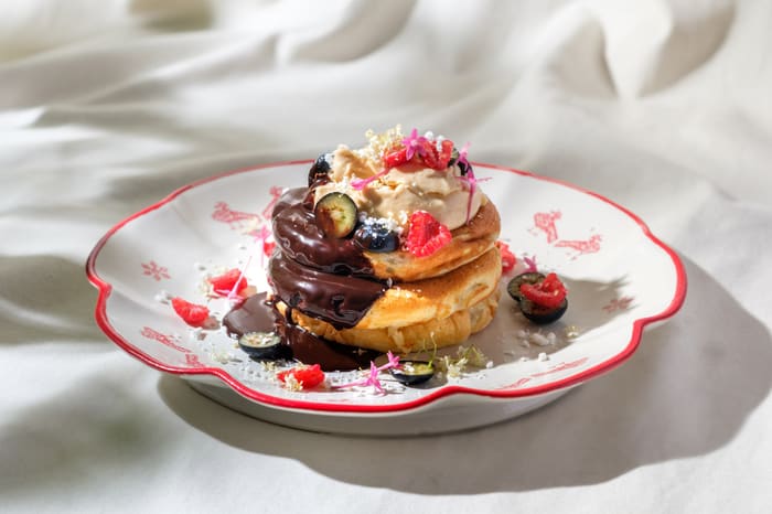 Signature Brie Pancakes with Banana, Chocolate and Dolce de Leche — Brie Restaurant & Cheesery, Ubud